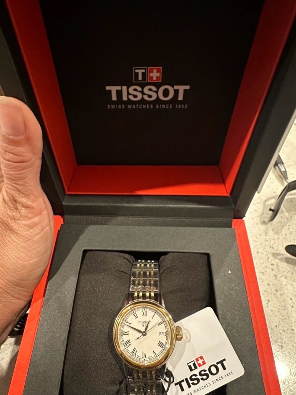 Tissot Two-Tone Dress Watch with White Dial and Roman Numerals
